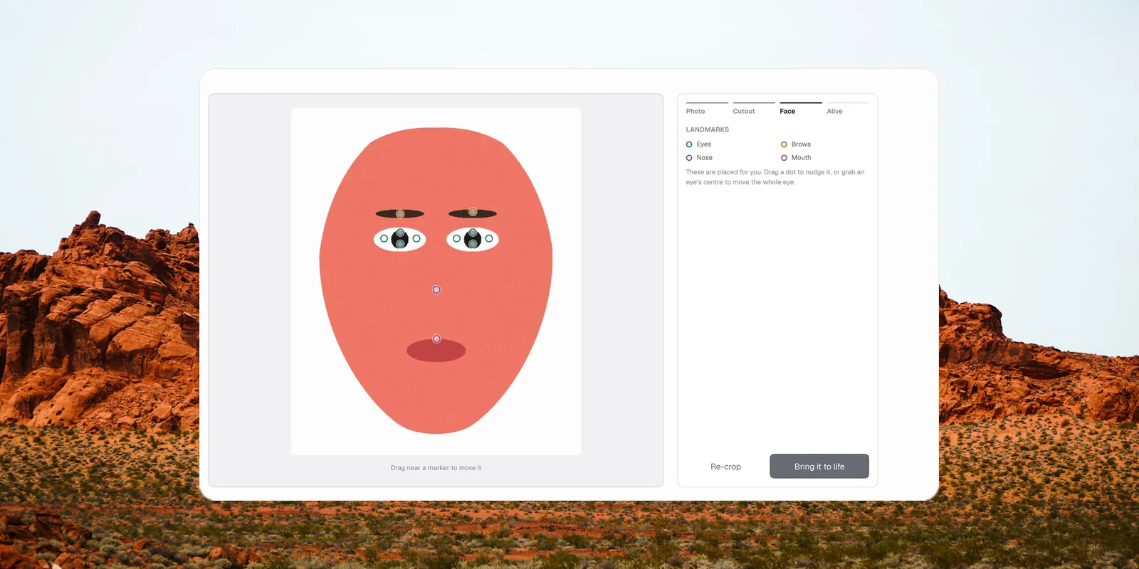 The head builder's landmark step, with eye, brow and mouth markers placed on a cut-out face.